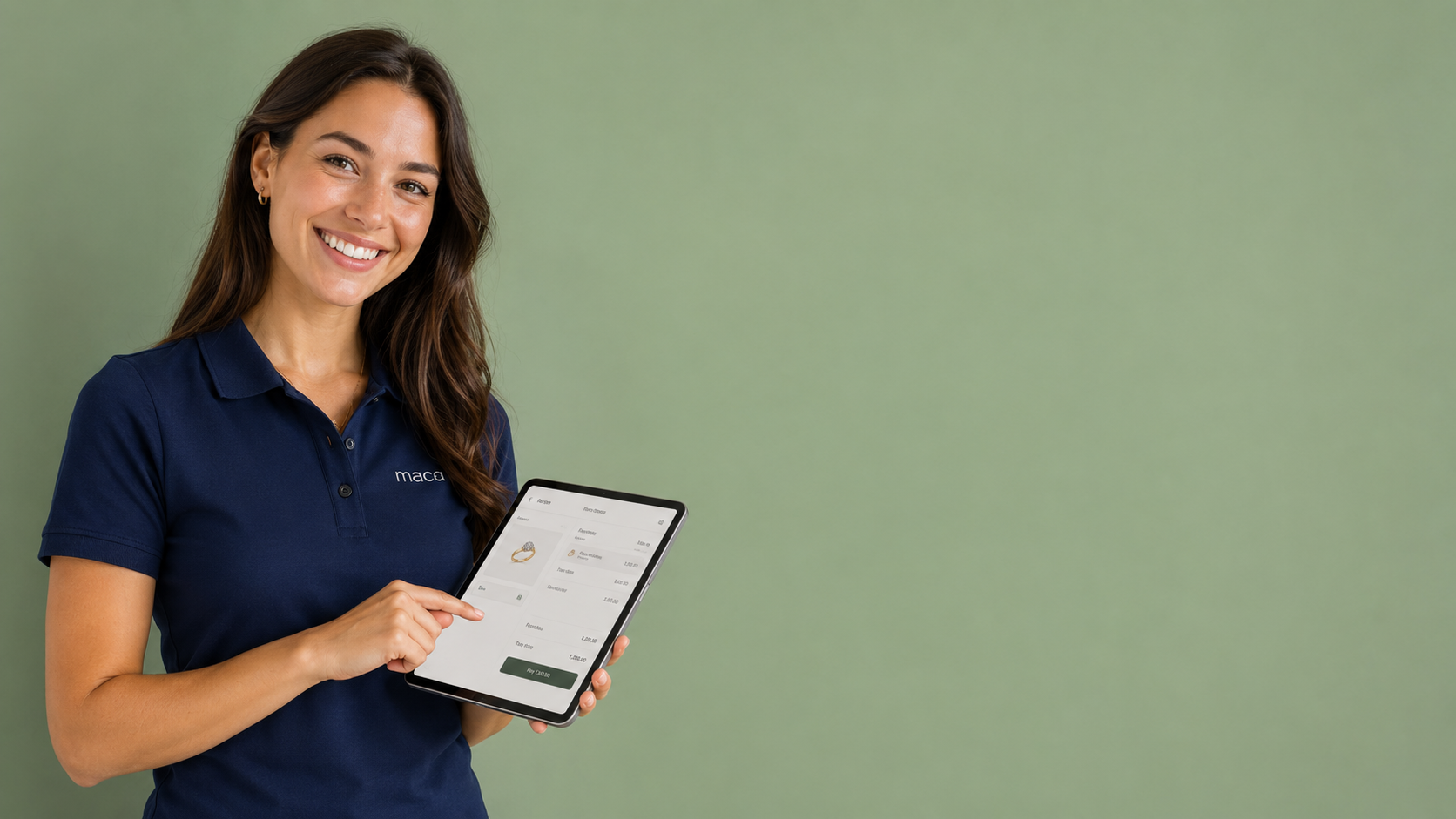A maca sales associate ringing up a sale on a tablet